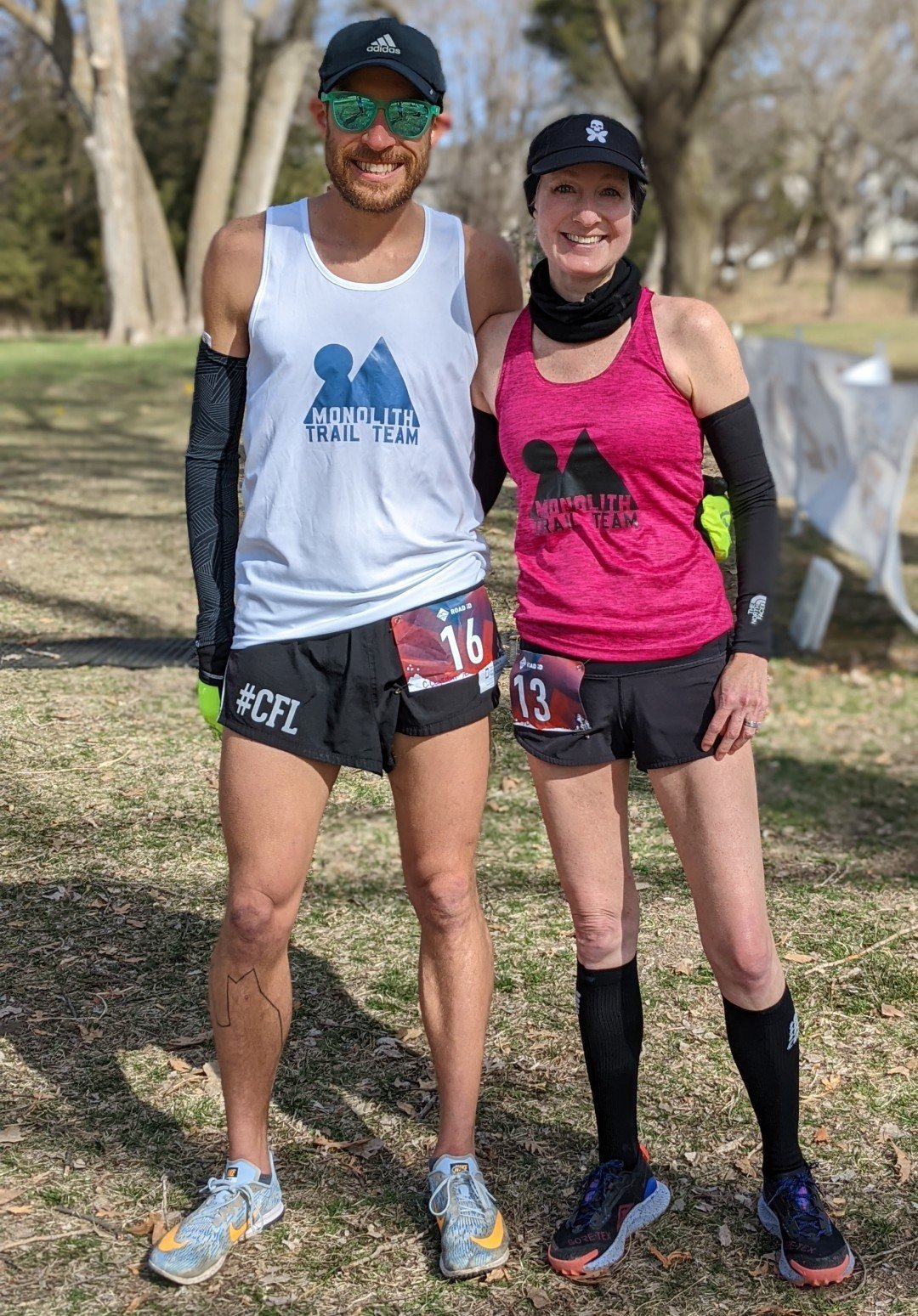 cory logsdon and emily langdon pose for a photo after the tails n trails half marathon in omaha nebraska